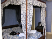 Four poster bed in room in Hostellerie de la Poste, Avallon, Burgandy France